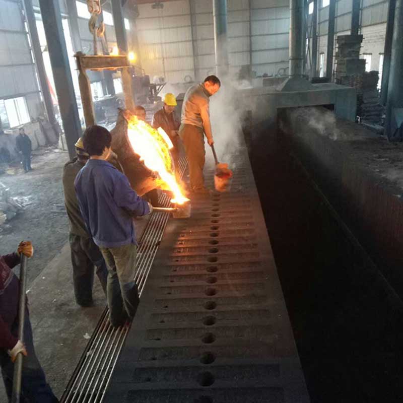 molten metal pouring at casting foundry